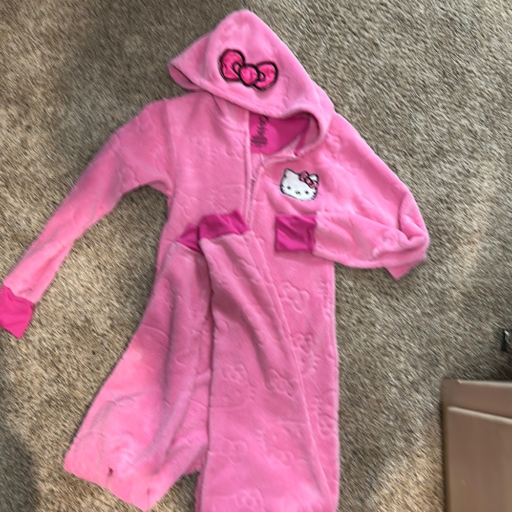 Pink Hello Kitty onesie with open feet